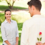 Man offering a rose to his girlfriend
